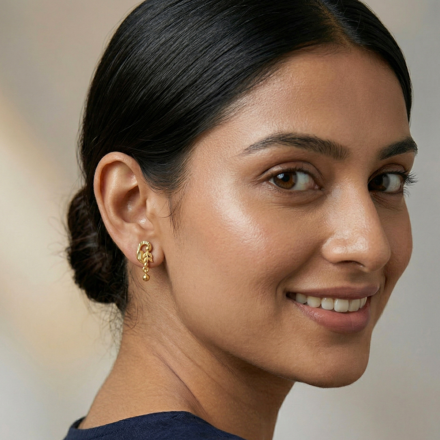 gira gold plated leaf earrings