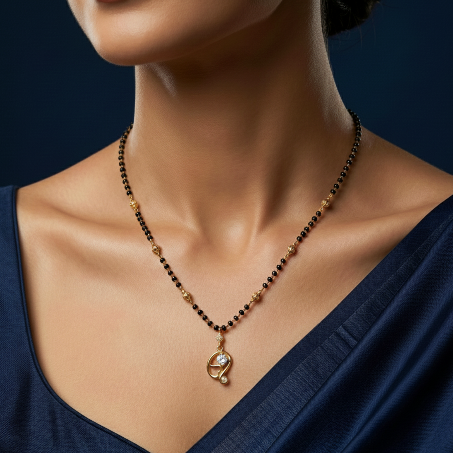the artistic curve 18 kt thick gold plated mangalsutra