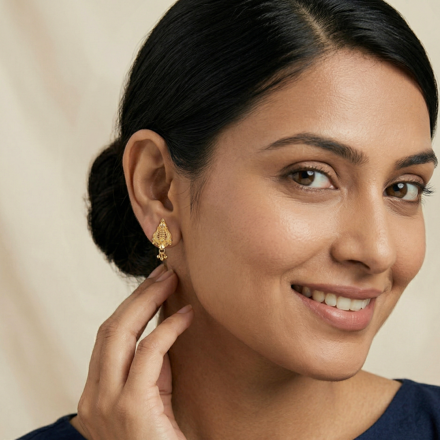 trishula gold plated earrings