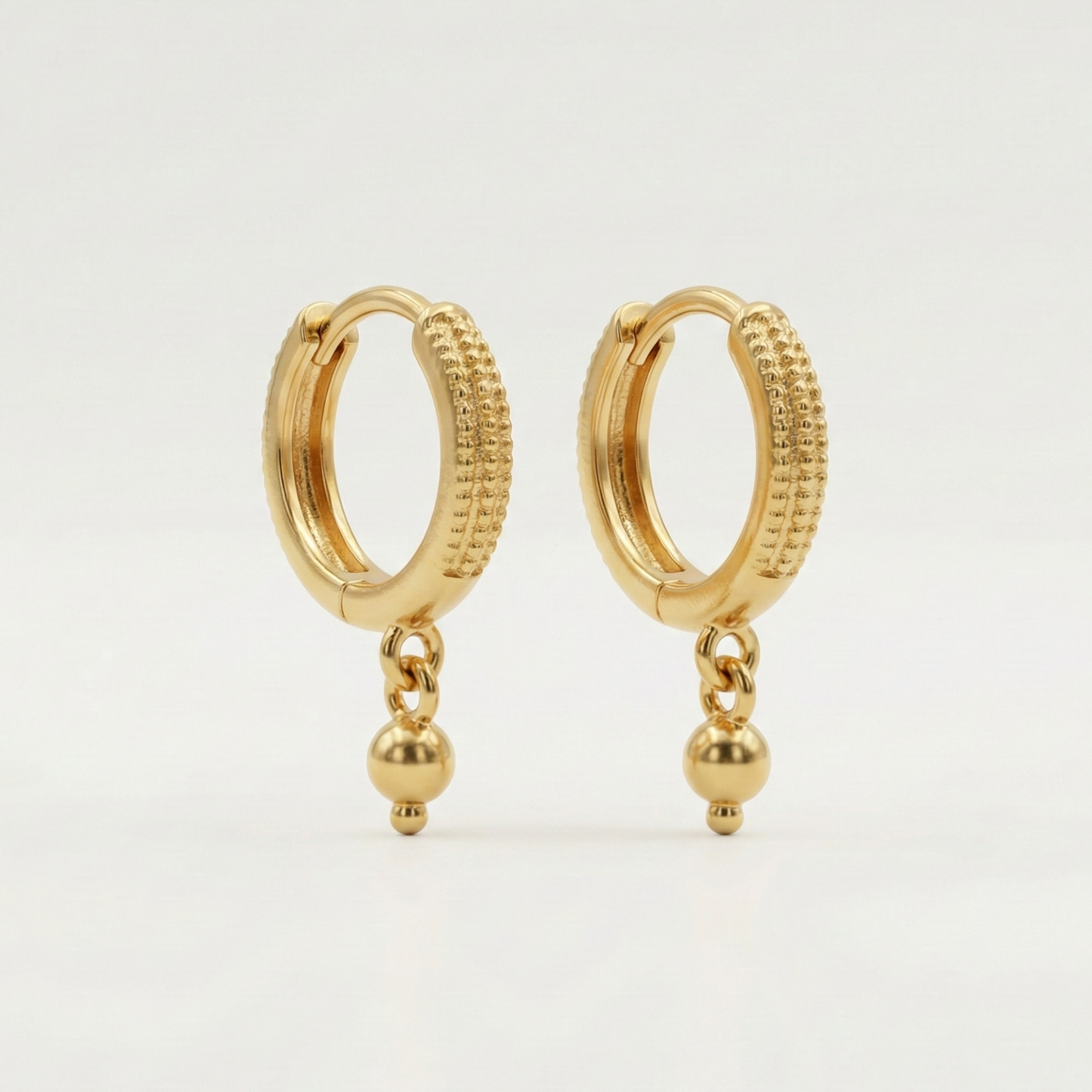 nayana textured gold plated hoop drops